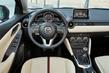 The compact five-door hatchback Mazda 2 photo 5