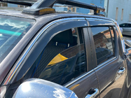 Toyota Hilux 2015- Window deflectors with chrome trim (4 pcs, Niken) photo 3