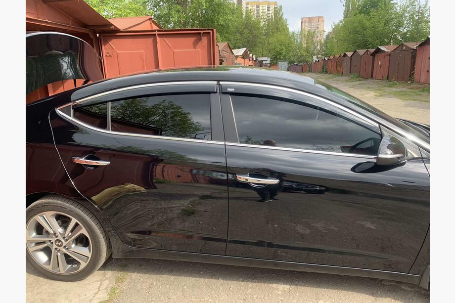 Hyundai Elantra (AD) 2015-2020 Window deflectors with chrome trim (4 pcs, Niken) Image