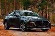 The fourth generation compact sedan Mazda 3 photo 1