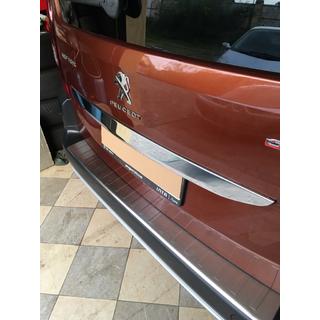 Stainless steel trim above license plate photo 4