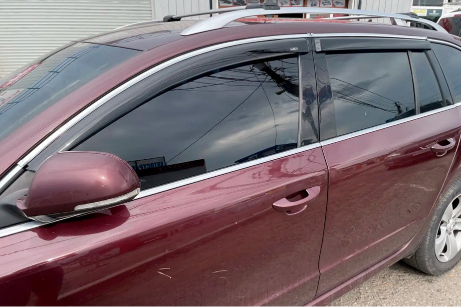 Skoda Superb 2009-2015 Window deflectors with chrome trim SW (4 pcs, HIC) Image
