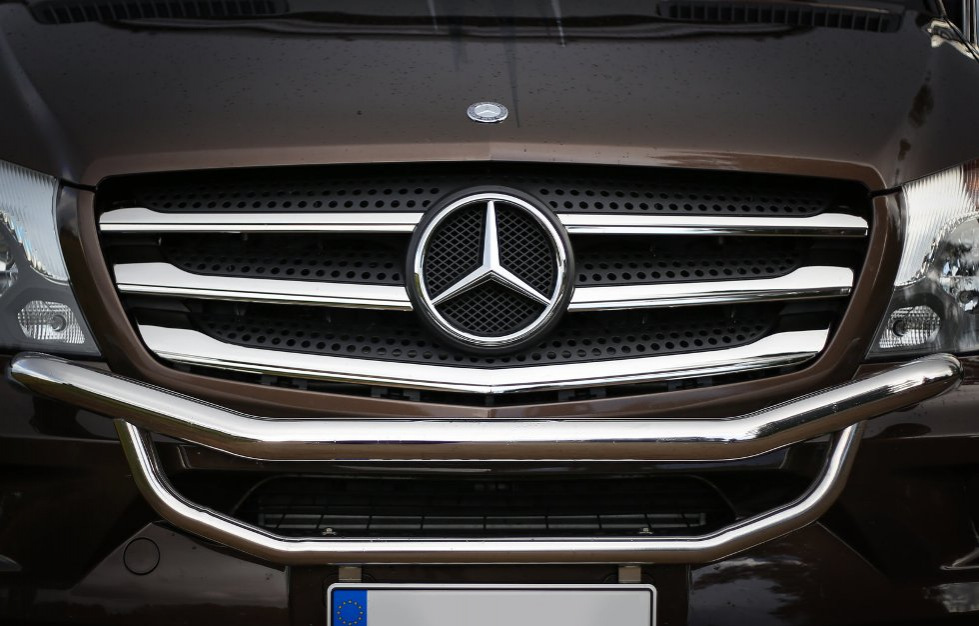 Chrome trim on the radiator grille of the car