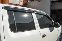 Volkswagen Amarok 2010-2022 Window deflectors with chrome trim (4 pcs, Niken) photo 3