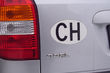 How to easily and efficiently remove a sticker from a car photo 1