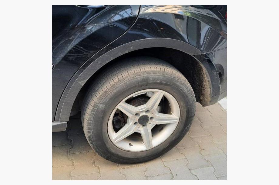 Mercedes ML W164 2005-2011 Fender flares (4 pcs, black, ABS plastic) Photo 2