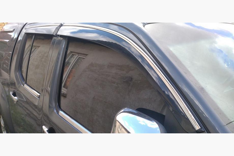 Nissan Navara 2006-2015 Window Deflectors with Chrome Trim (4 pcs, Sunplex Chrome) Image