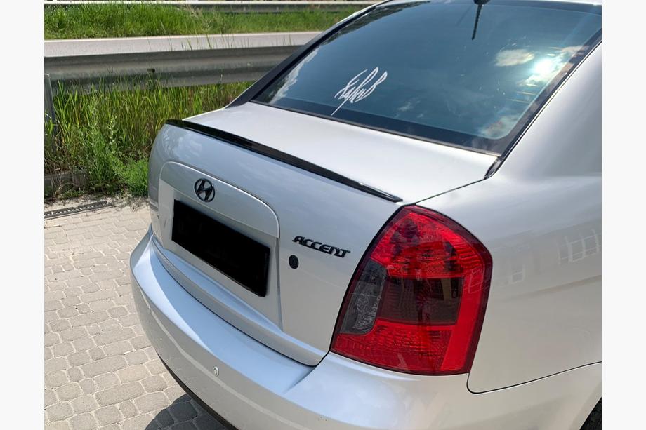 Hyundai Accent 2006-2010 Spoiler LIP (Sunplex, black) (115.8cm x 6.3cm) Photo 1