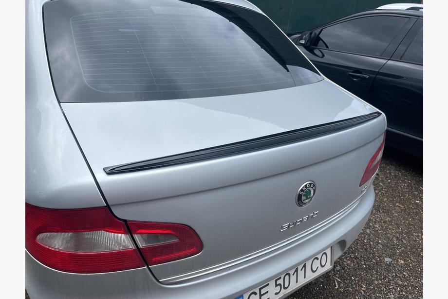 Skoda Superb 2009-2015 Spoiler LIP (Sunplex, black) (115.8cm x 6.3cm) Image
